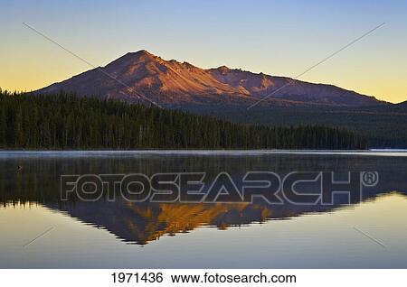 Stock Photograph - Oregon, Cascade Mountains, Summit Lake And Diamond Peak, Sunrise Light.. Fotosearch