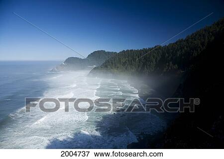 Oregon, Central Coastline Near Town Of Florence, Historic Heceta Head Lighthouse In Distance On Cliffside. View Large Photo Image Stock Photo - Oregon, Central Coastline Near Town Of Florence, Historic Heceta Head Lighthouse In Distance On Cliffside.. Fotosearch