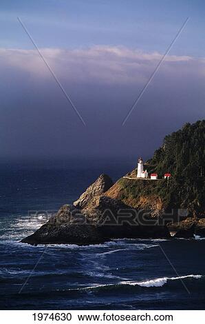 Stock Image - Oregon, Devils Elbow State Park, Heceta Head Lighthouse Overlooking Ocean And Waves.. Fotosearch