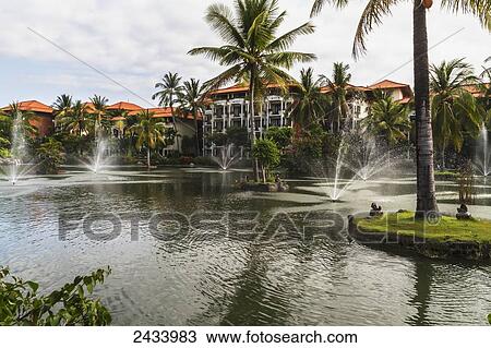 Stock Image - Ornamental pool in the grounds of Ayodya Resort, Nusa Dua, Bali, Indonesia. Fotosearch