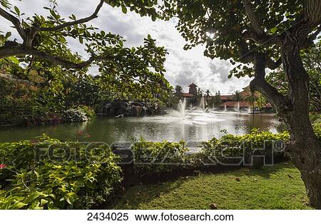 Stock Photography - Ornamental pool in the grounds of Ayodya Resort, Nusa Dua, Bali, Indonesia. Fotosearch