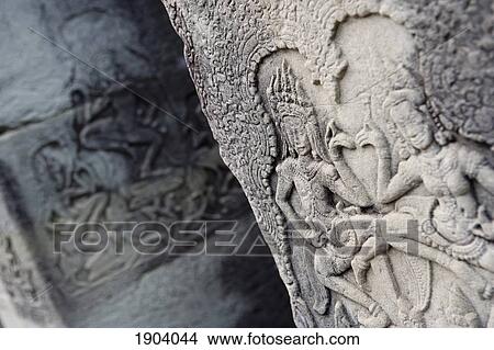 Ornate Carvings On Walls Of Bayon Temple, Angkor, Siem Reap, Cambodia View Large Photo Image Picture - Ornate Carvings On Walls Of Bayon Temple, Angkor, Siem Reap, Cambodia. Fotosearch