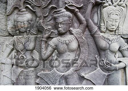 Ornate Carvings On Walls Of Bayon Temple, Angkor, Siem Reap, Cambodia View Large Photo Image Stock Photograph - Ornate Carvings On Walls Of Bayon Temple, Angkor, Siem Reap, Cambodia. Fotosearch