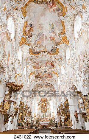Ornate interior and ceiling and centre aisle of a church; Bavaria, Germany View Large Photo Image Stock Image - Ornate interior and ceiling and centre aisle of a church; Bavaria, Germany. Fotosearch
