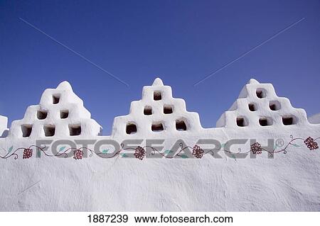Stock Photo - Ornate Wall Of Mud Building, Close Up. Fotosearch