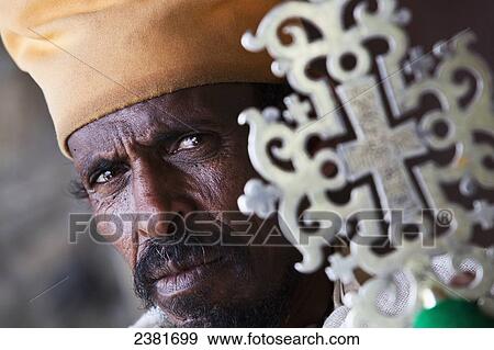 Orthodox priest with ceremonial cross; Ethiopia View Large Photo Image Stock Photo - Orthodox priest with ceremonial cross; Ethiopia. Fotosearch