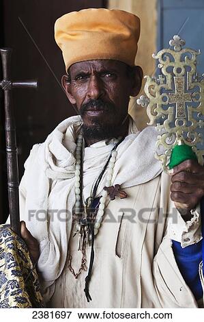 Orthodox priest with ceremonial crosses; Ethiopia View Large Photo Image Stock Photo - Orthodox priest with ceremonial crosses; Ethiopia. Fotosearch