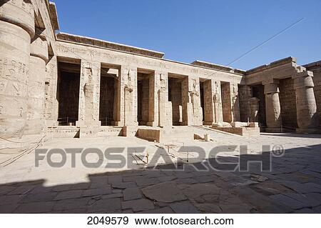 Stock Photo - Osirian Columns In The Second Courtyard Of The Mortuary Temple Of Ramses Iii, Medinat Habu, Luxor, Qina, Egypt. Fotosearch