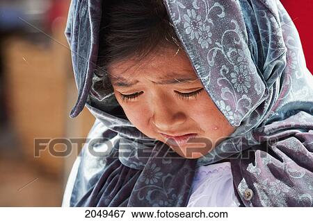 Stock Photo - Otavaleno Girl Crying, Otavalo, Imbabura, Ecuador. Fotosearch