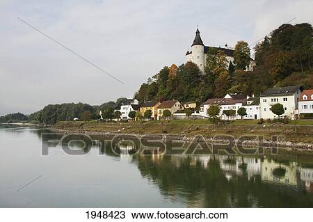 Stock Image - Ottensheim and Ottensheim Castle, as seen from the Danube River, Upper Austria, Austria. Fotosearch