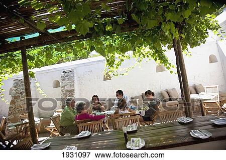 Stock Photo - Outdoor Lunching, Scenes At Constantia Wineyard; Outdoor Lunching, Scenes At Constantia Wineyard, Cape Town, South Africa&#13; &#10. Fotosearch
