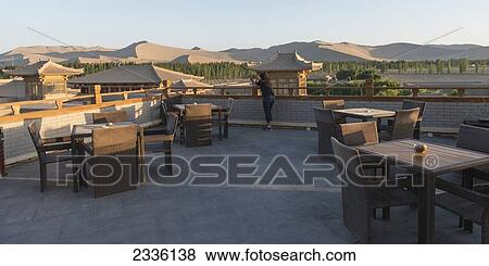 Stock Photo - Outdoor Patio At Dun Huang Silk Road Hotel; Jiuquan, Gansu, China. Fotosearch