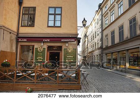Stock Photo - Outdoor Patio Of A Cafe Along The Street In Gamla Stan Old Town; Stockholm Sweden. Fotosearch