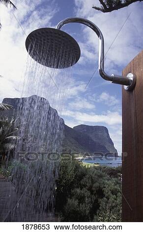 Stock Image - Outdoor Shower And Coastline. Fotosearch