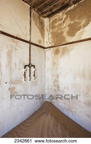 Outlet And Sand In Abandoned House; Kolmanskop Ghost Town, Namibia View Large Photo Image Stock Image - Outlet And Sand In Abandoned House; Kolmanskop Ghost Town, Namibia. Fotosearch