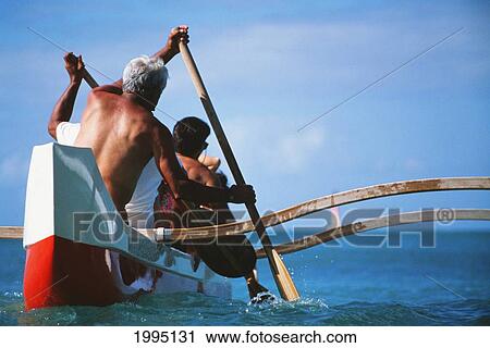 Outrigger Canoe Paddling, Close-Up View From Behind. View Large Photo Image Stock Image - Outrigger Canoe Paddling, Close-Up View From Behind.. Fotosearch