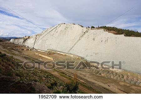 Stock Photo - Over 5, 000 footprints of 332 varieties of dinosaurs cover the wall of Cal Orck'o, Chuquisaca Department, Bolivia. Fotosearch