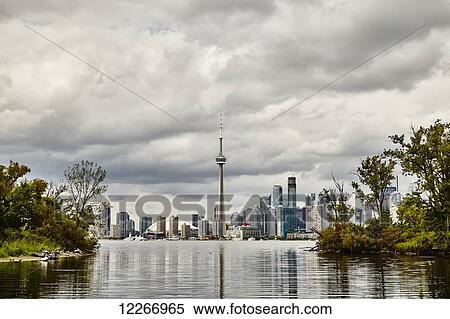 Overcast skyline taken from the Toronto Islands; Toronto, Ontario, Canada View Large Photo Image Stock Photography - Overcast skyline taken from the Toronto Islands; Toronto, Ontario, Canada. Fotosearch