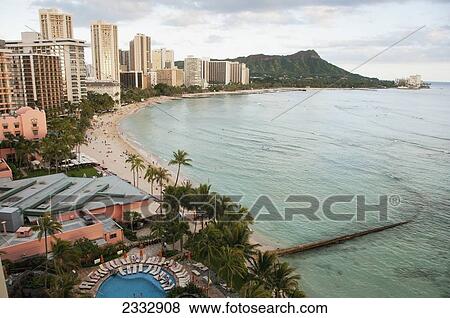 Stock Photo - Overlooking The Coastline And Waikiki Beach; Waikiki, Oahu, Hawaii, United States Of America. Fotosearch