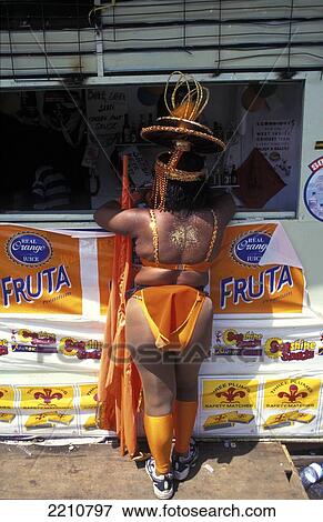 Stock Photo - Overweight Woman At A Snack Bar At Carnival, Port O'spain, Trinidad. Fotosearch