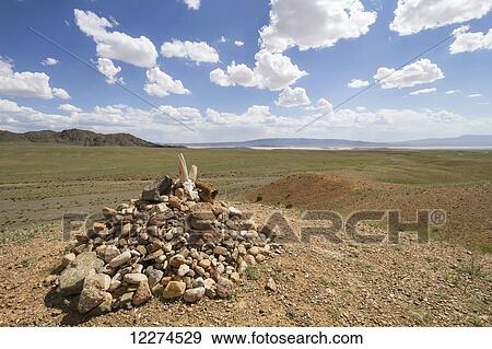 Stock Photo - Ovoo with goat skull, Gobi Gurvansaikhan National Park, ÃƒÆ’Ã¢â‚¬â€œmnÃƒÆ’Ã‚Â¶govi Province, Mongolia. Fotosearch
