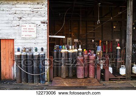 Stock Photograph - Oxygen bottles at Dollarton Ship Yard, North Vancouver, British Columbia, Canada. Fotosearch