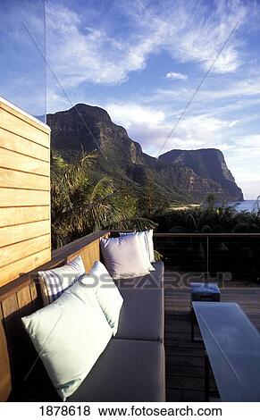 Padded Bench On Patio Beside Mountains Lidgbird And Gower View Large Photo Image Stock Photo - Padded Bench On Patio Beside Mountains Lidgbird And Gower. Fotosearch