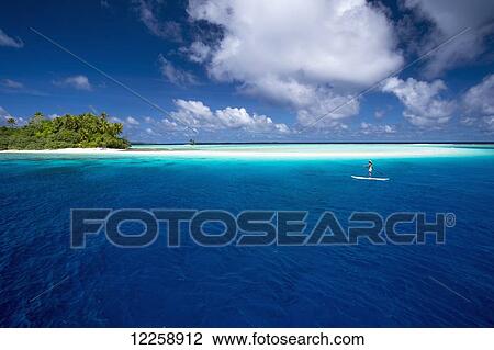 Paddle boarding by a remote atoll of the Marshall Islands; Marshall Islands View Large Photo Image Stock Image - Paddle boarding by a remote atoll of the Marshall Islands; Marshall Islands. Fotosearch
