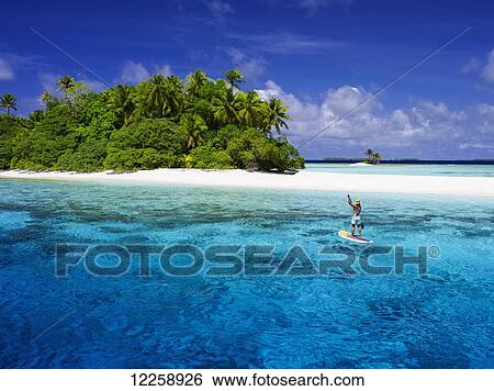 Paddle boarding off a remote island; Marshall Islands View Large Photo Image Stock Photograph - Paddle boarding off a remote island; Marshall Islands. Fotosearch