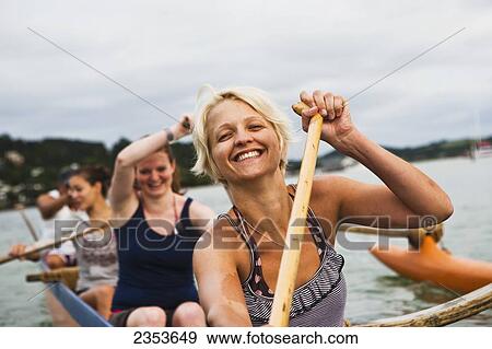 Paddling On A Waka In The Bay Of Islands; New Zealand View Large Photo Image Stock Photo - Paddling On A Waka In The Bay Of Islands; New Zealand. Fotosearch