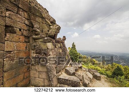 Stock Image - Paduraksa (roofed-gate) to the first terrace of the 15th-century Javanese-Hindu temple, Candi Sukuh, Central Java, Indonesia. Fotosearch