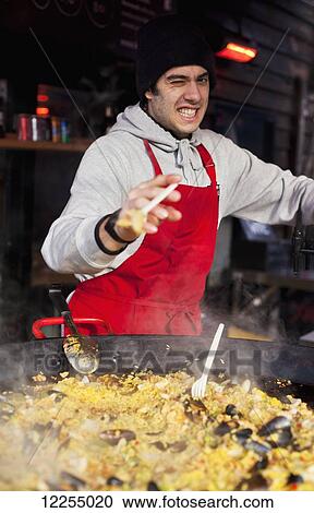 Paella salesman, Camden Market; London, England View Large Photo Image Stock Image - Paella salesman, Camden Market; London, England. Fotosearch
