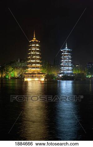 Stock Photograph - Pagodas Reflected In Shan Lake; Guilin, Guangxi, China. Fotosearch