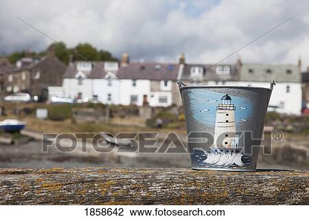 Stock Image - Pail With Image Of Lighthouse On It. Fotosearch