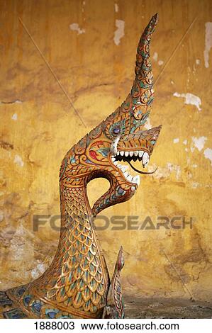 Stock Image - Painted Dragon Statue At Wat Si Saket.. Fotosearch