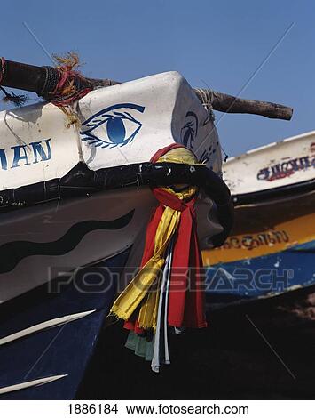 Picture - Painted Fishing Boats With Ribbons, Close Up. Fotosearch