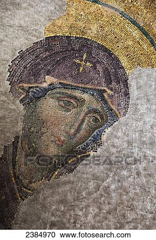 Stock Image - Painted religious figure on a worn wall; Istanbul, Turkey. Fotosearch