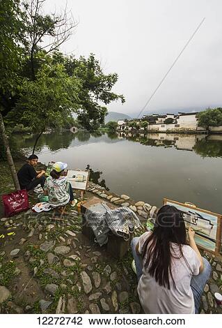 Painters by Nanhu Lake, Hongcun, Anhui, China View Large Photo Image Stock Image - Painters by Nanhu Lake, Hongcun, Anhui, China. Fotosearch