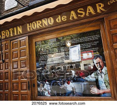 Stock Photography - Painting Of Ernest Hemingway On A Restaurant Window; Madrid Spain. Fotosearch
