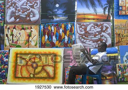 Stock Image - Painting Salesman Reading Newspaper. Fotosearch