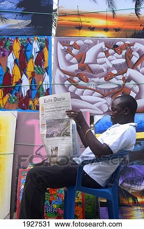 Stock Image - Painting Salesman Reading Newspaper. Fotosearch
