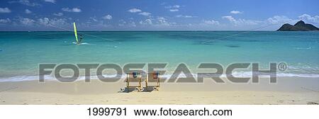 Pair Of Beach Chairs Along Shoreline, Facing Water, Windsurfer Blur Action C1758 View Large Photo Image Stock Image - Pair Of Beach Chairs Along Shoreline, Facing Water, Windsurfer Blur Action C1758. Fotosearch
