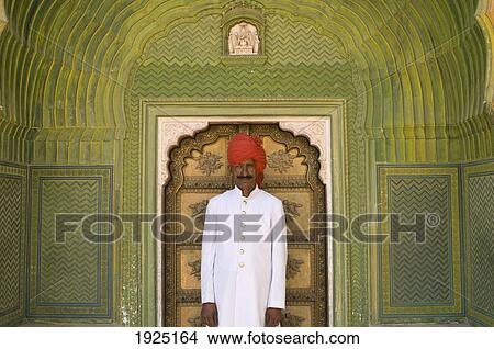 Palace Guard In Decorated Entrance Area Of Small Door Of The City Palace, Jaipur, Rajasthan, India View Large Photo Image Picture - Palace Guard In Decorated Entrance Area Of Small Door Of The City Palace, Jaipur, Rajasthan, India. Fotosearch