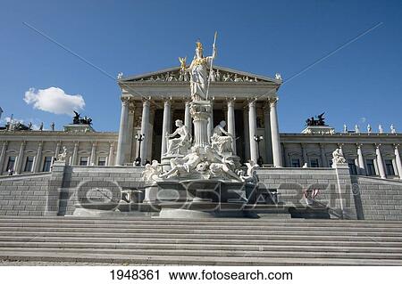 Stock Image - Pallas Athena statue in the Athenebrunnen fountain in front of the Parliament building, Vienna (Wien), Austria. Fotosearch