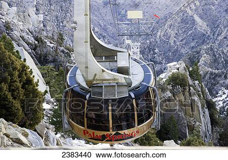 Stock Image - Palm Springs aerial tramway arrives at Mountain Station; Palm Springs, California, United States of America. Fotosearch