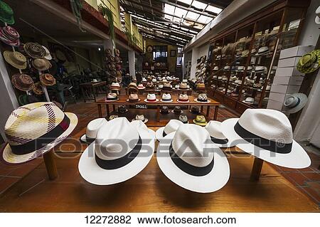 Stock Image - Panama hats for sale in the showroom of the Barranco Panama Hat Factory, Cuenca, Azuay, Ecuador. Fotosearch