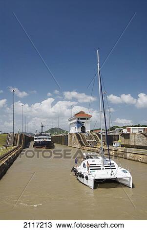 Panama, Panama Canal, boats travelling through the Miraflores Locks. View Large Photo Image Stock Image - Panama, Panama Canal, boats travelling through the Miraflores Locks.. Fotosearch