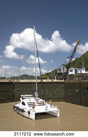 Stock Image - Panama, Panama Canal, catamaran in Pedro Miguel Lock.. Fotosearch