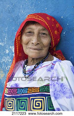 Stock Image - Panama, San Blas Islands (also called Kuna Yala Islands), Playon Chico Village, Kuna woman. Fotosearch