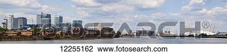 Panorama view of the River Thames, Canary Wharf and the O2 Arena; London, England View Large Photo Image Stock Image - Panorama view of the River Thames, Canary Wharf and the O2 Arena; London, England. Fotosearch